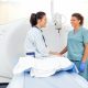 Patient and nurse before scan