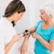 Doctor performing skin exam