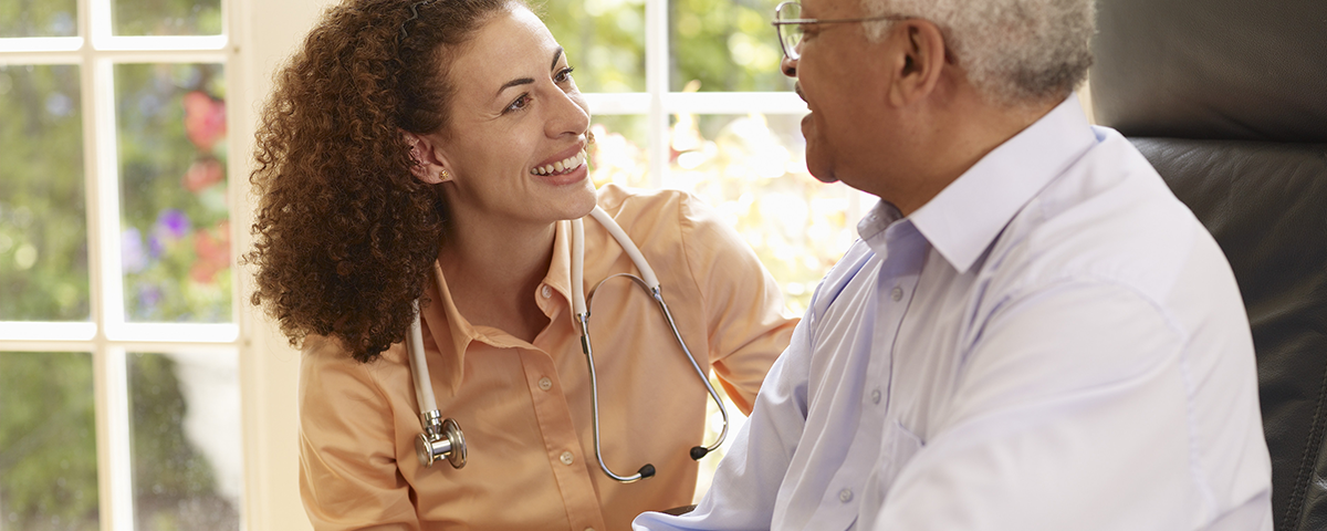 Doctor smiling with patient