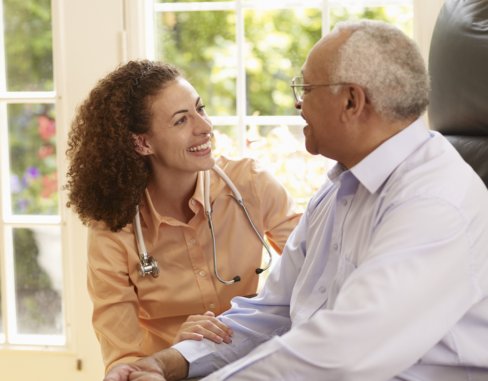 Doctor smiling with patient