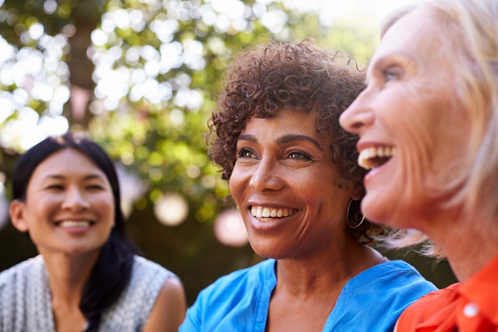 Diverse women smiling