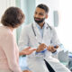Patient and doctor speaking in exam room
